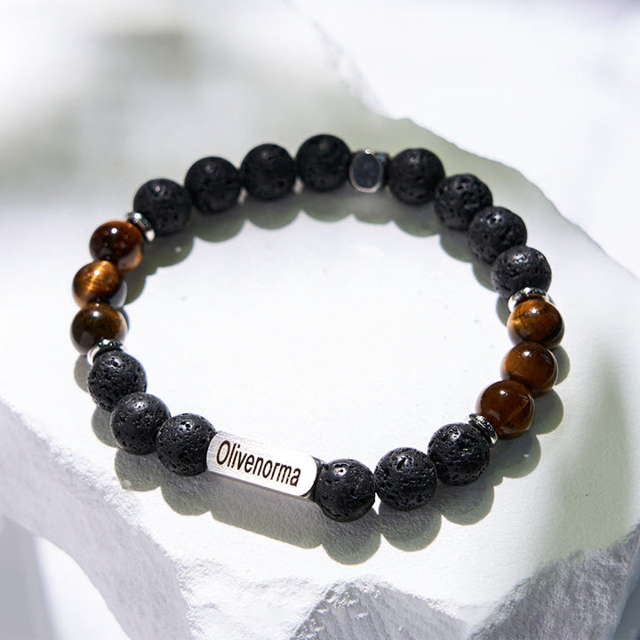 Bracelet en pierre de lave et œil de tigre gravé Olivenorma - image 4