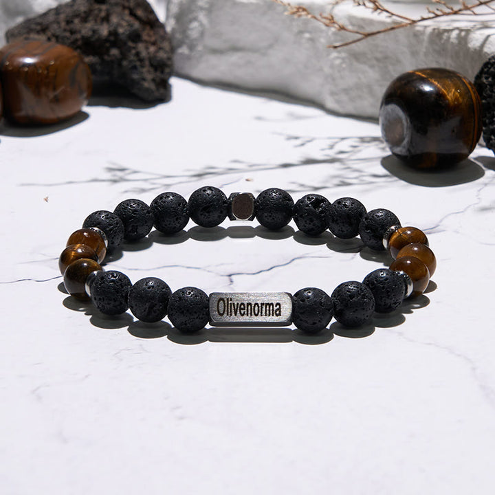 Bracelet en pierre de lave et œil de tigre gravé Olivenorma - image 3