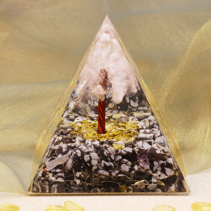 Pyramide d'orgone en quartz rose Olivenorma avec obsidienne flocon de neige