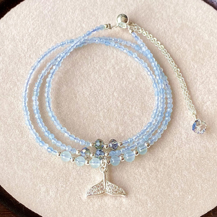 Collier pendentif queue de poisson et bracelet multicouches en aigue-marine Olivenorma