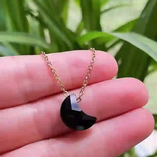 Collier Olivenorma en acier inoxydable avec cristal naturel taillé en lune