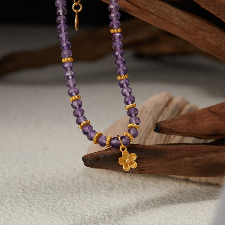 Collier et bracelet avec pendentif en forme de fleur en perles d'améthyste naturelle Olivenorma
