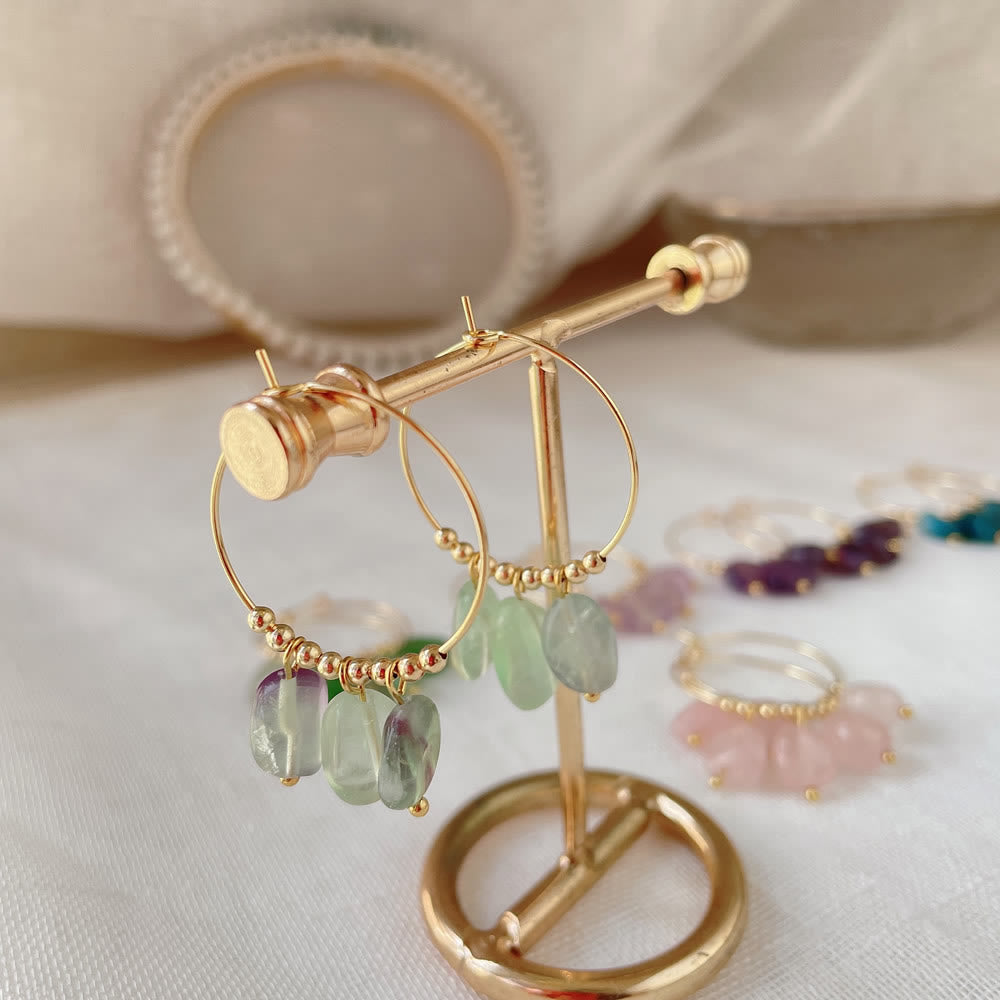 Boucles d'oreilles pendantes en acier titane et cristal concassé naturel Olivenorma
