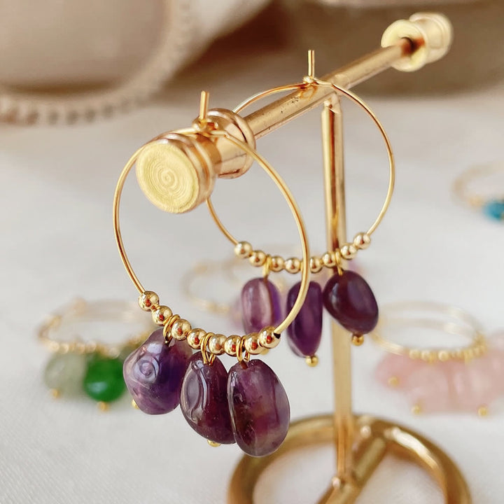 Boucles d'oreilles pendantes en acier titane et cristal concassé naturel Olivenorma