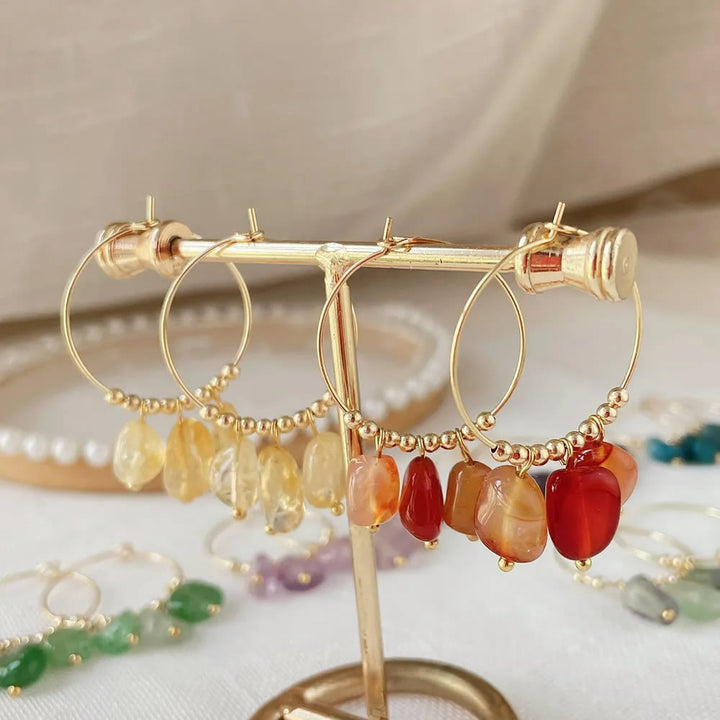 Boucles d'oreilles pendantes en acier titane et cristal concassé naturel Olivenorma