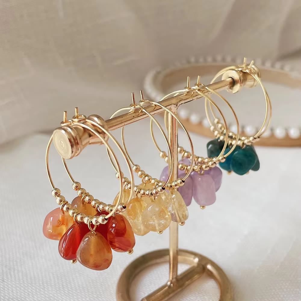 Boucles d'oreilles pendantes en acier titane et cristal concassé naturel Olivenorma