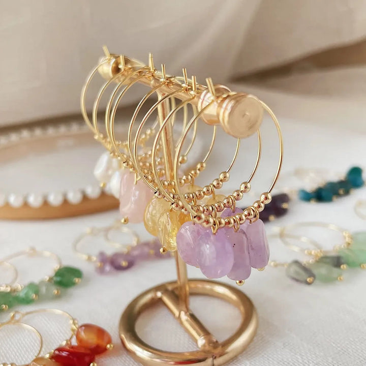 Boucles d'oreilles pendantes en acier titane et cristal concassé naturel Olivenorma