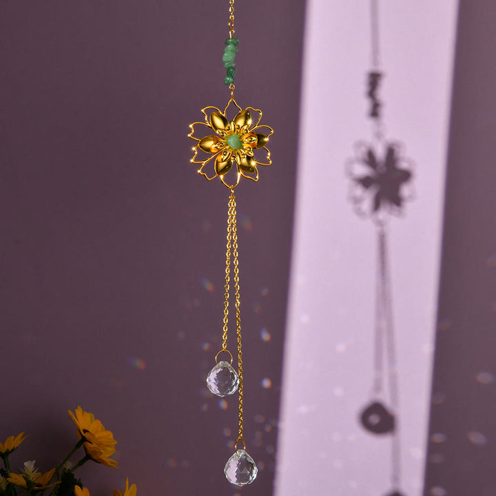 Pendentif attrape-soleil en gravier naturel avec lotus Olivenorma