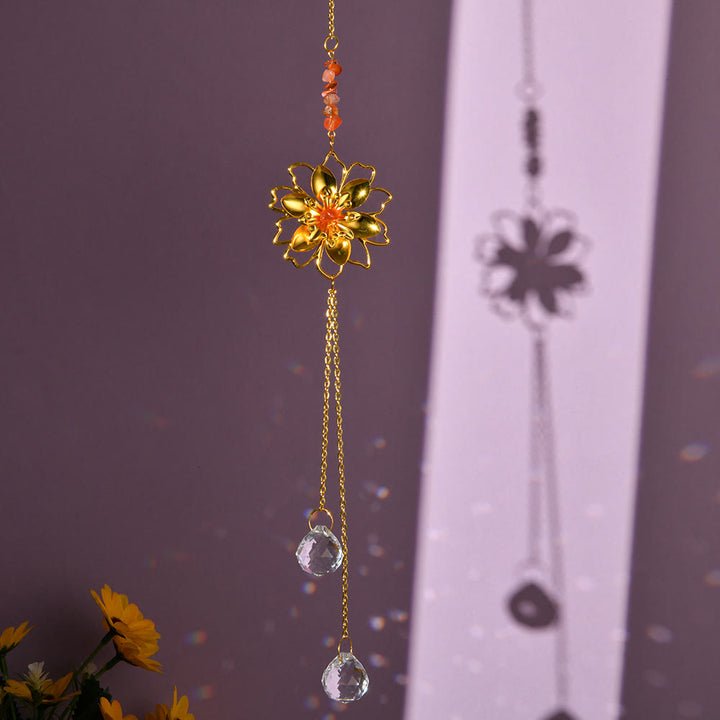Pendentif attrape-soleil en gravier naturel avec lotus Olivenorma