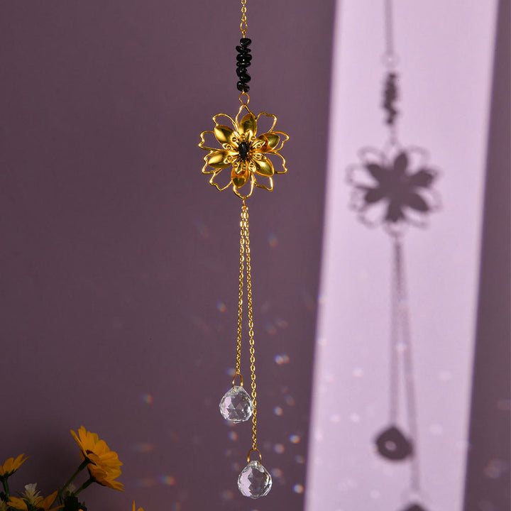 Pendentif attrape-soleil en gravier naturel avec lotus Olivenorma