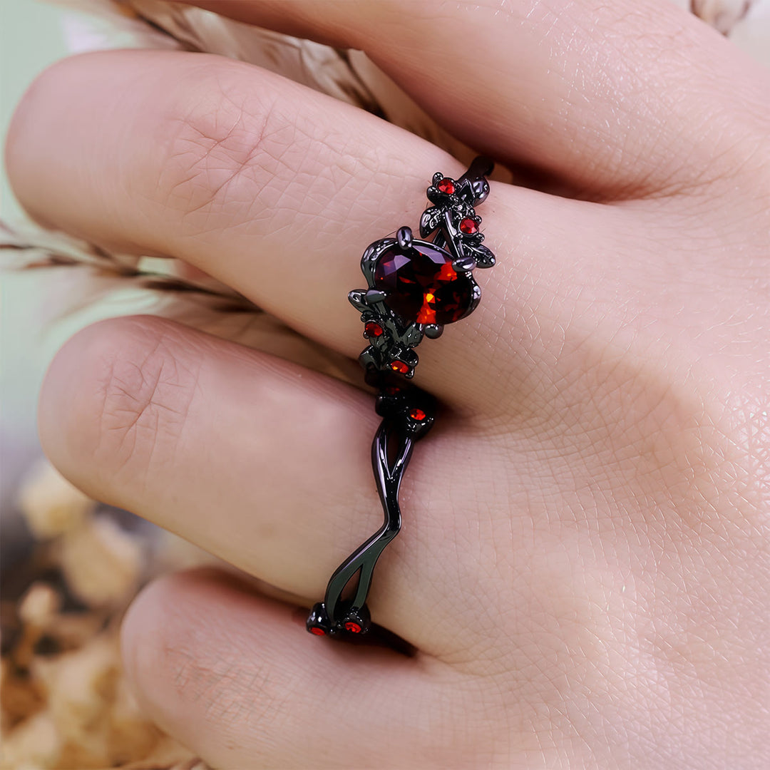 Bague vintage Olivenorma en rubis noir et feuille