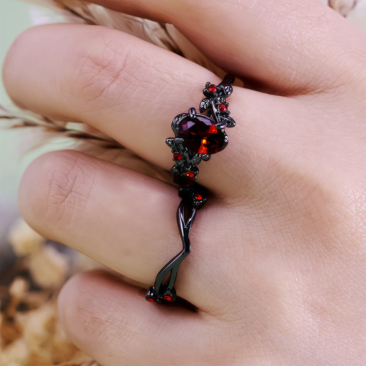 Bague vintage Olivenorma en rubis noir et feuille