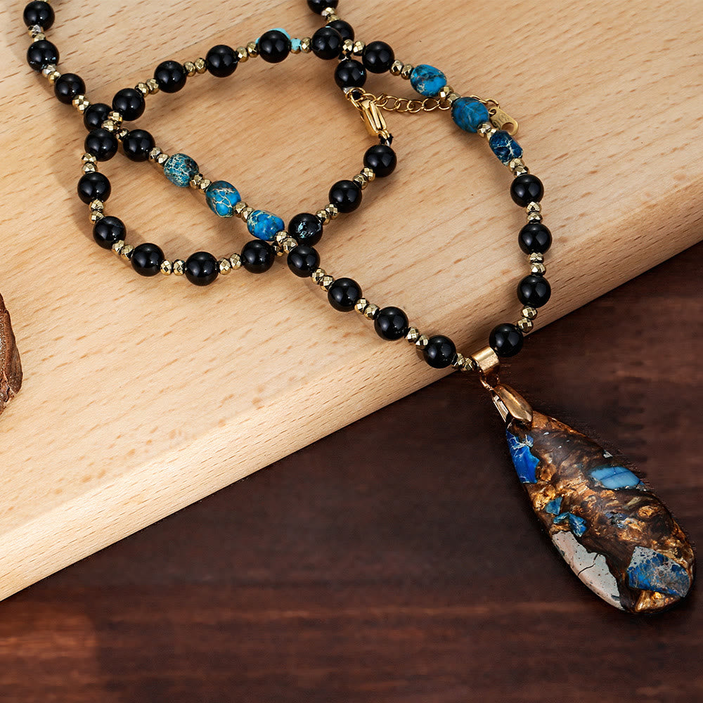 Collier pendentif en obsidienne bleue avec perles d'empereur Olivenorma
