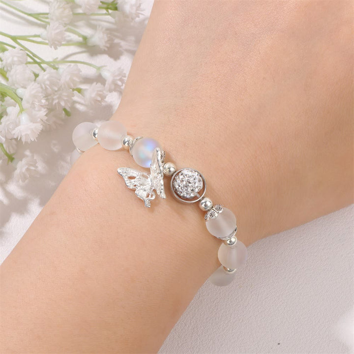 Bracelet pendentif papillon en perles de pierre de lune Olivenorma de 8 mm