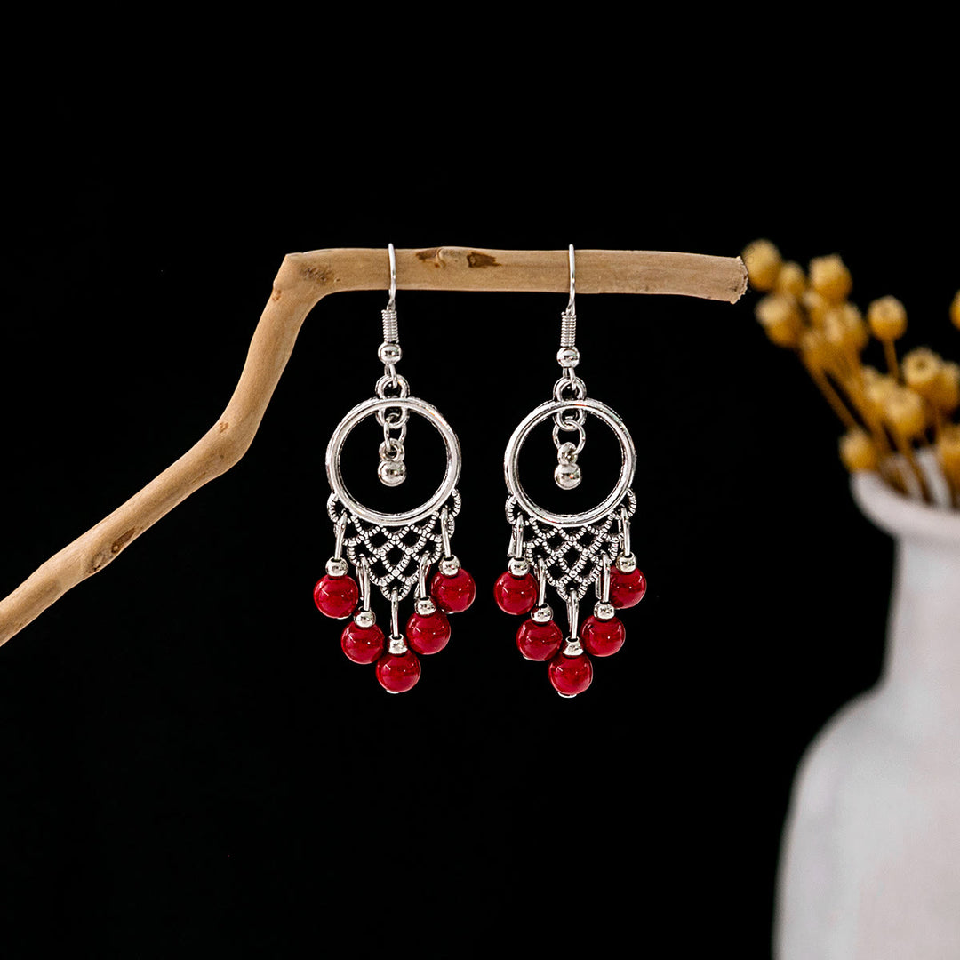 Boucles d'oreilles Olivenorma style ethnique rétro bohème à pampilles turquoise