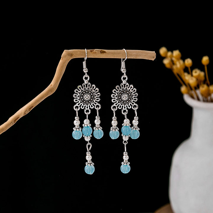 Boucles d'oreilles Olivenorma style ethnique rétro bohème à pampilles turquoise