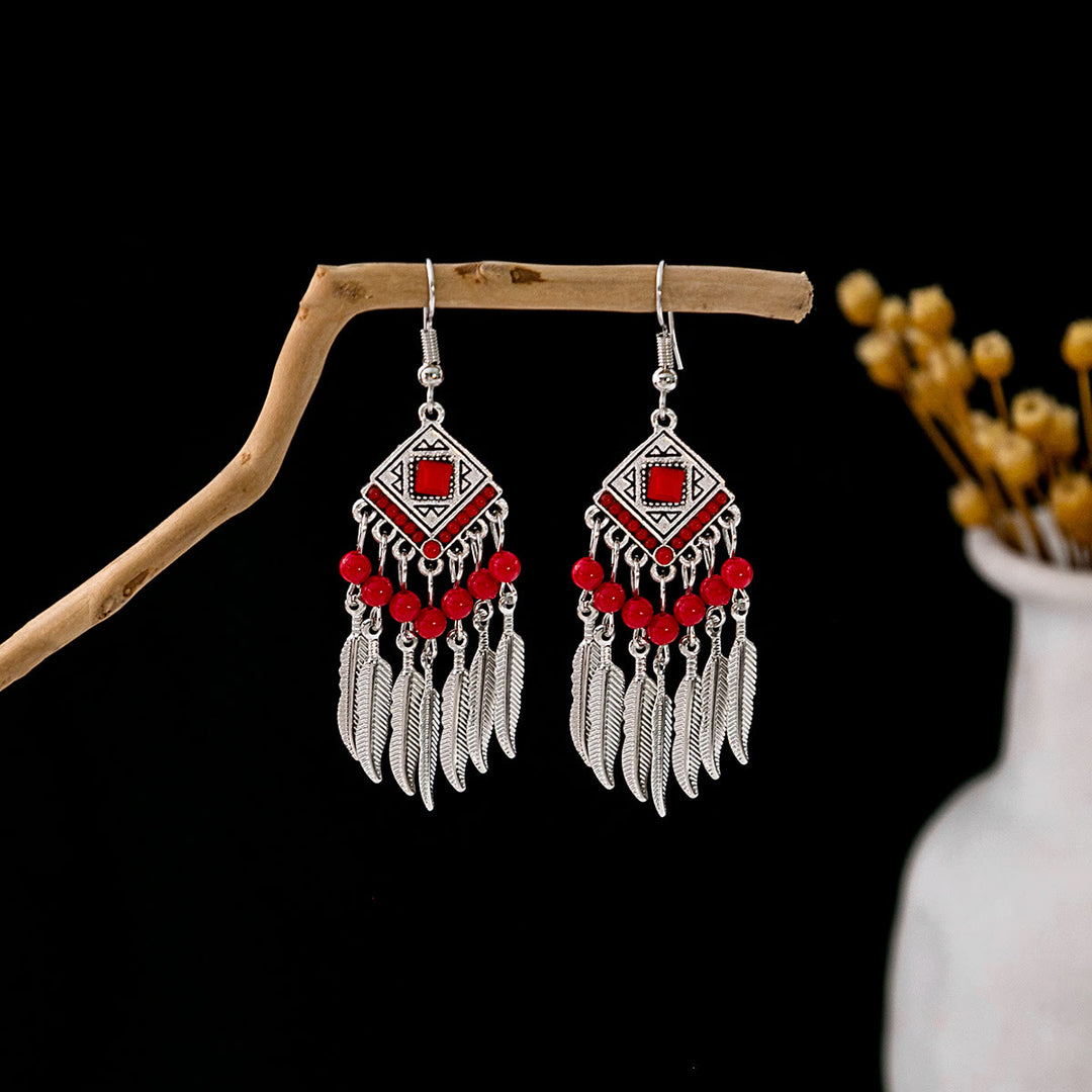 Boucles d'oreilles Olivenorma style ethnique rétro bohème à pampilles turquoise