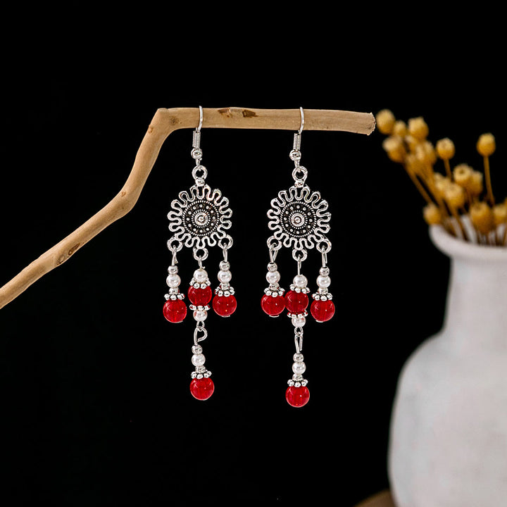Boucles d'oreilles Olivenorma style ethnique rétro bohème à pampilles turquoise