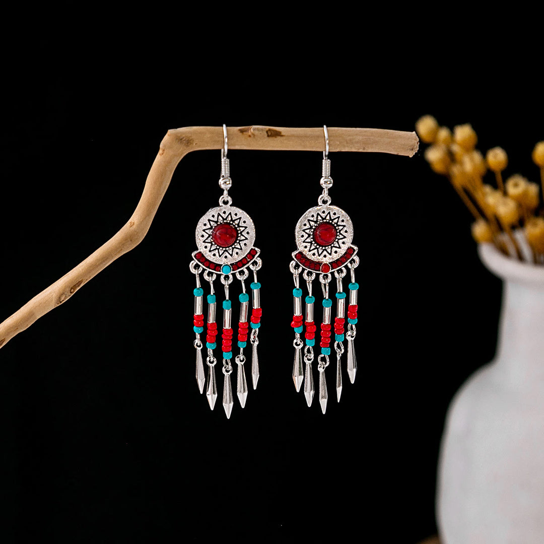 Boucles d'oreilles Olivenorma style ethnique rétro bohème à pampilles turquoise