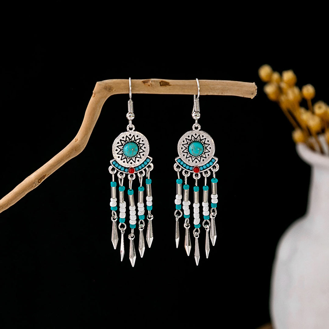 Boucles d'oreilles Olivenorma style ethnique rétro bohème à pampilles turquoise
