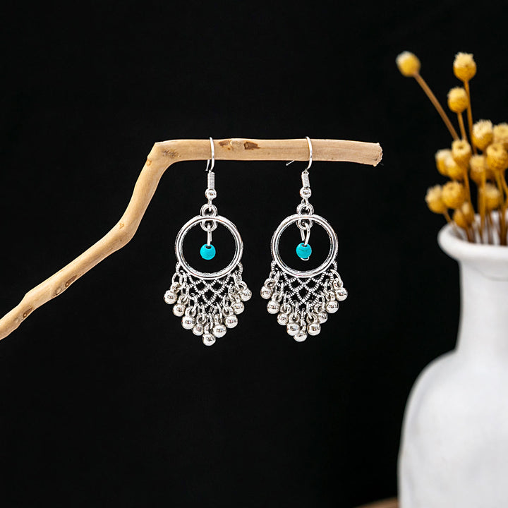 Boucles d'oreilles Olivenorma style ethnique rétro bohème à pampilles turquoise