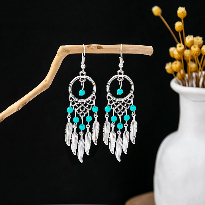 Boucles d'oreilles Olivenorma style ethnique rétro bohème à pampilles turquoise