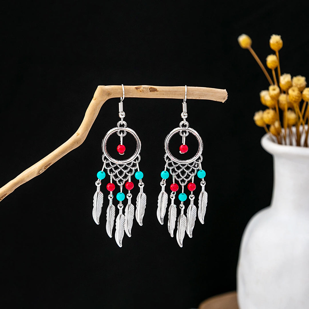 Boucles d'oreilles Olivenorma style ethnique rétro bohème à pampilles turquoise