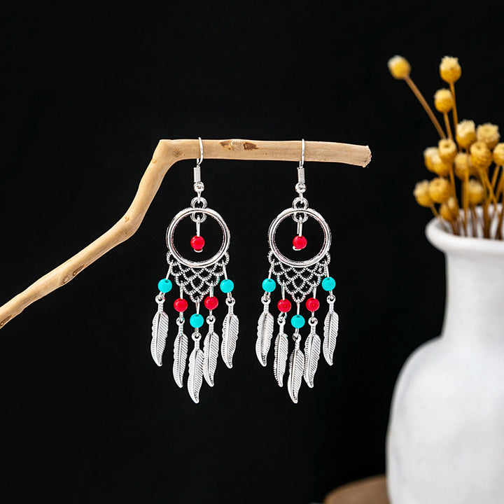 Boucles d'oreilles Olivenorma style ethnique rétro bohème à pampilles turquoise