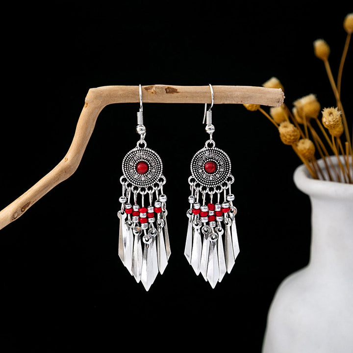 Boucles d'oreilles Olivenorma style ethnique rétro bohème à pampilles turquoise