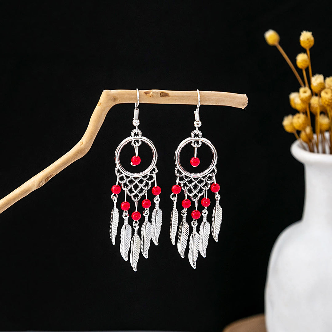 Boucles d'oreilles Olivenorma style ethnique rétro bohème à pampilles turquoise
