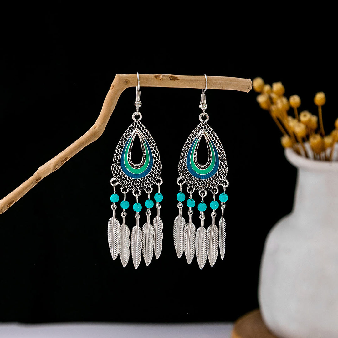 Boucles d'oreilles Olivenorma style ethnique rétro bohème à pampilles turquoise