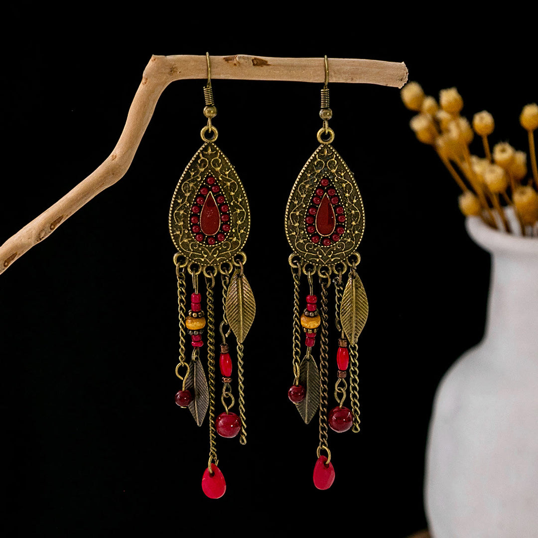 Boucles d'oreilles Olivenorma style ethnique rétro bohème à pampilles turquoise