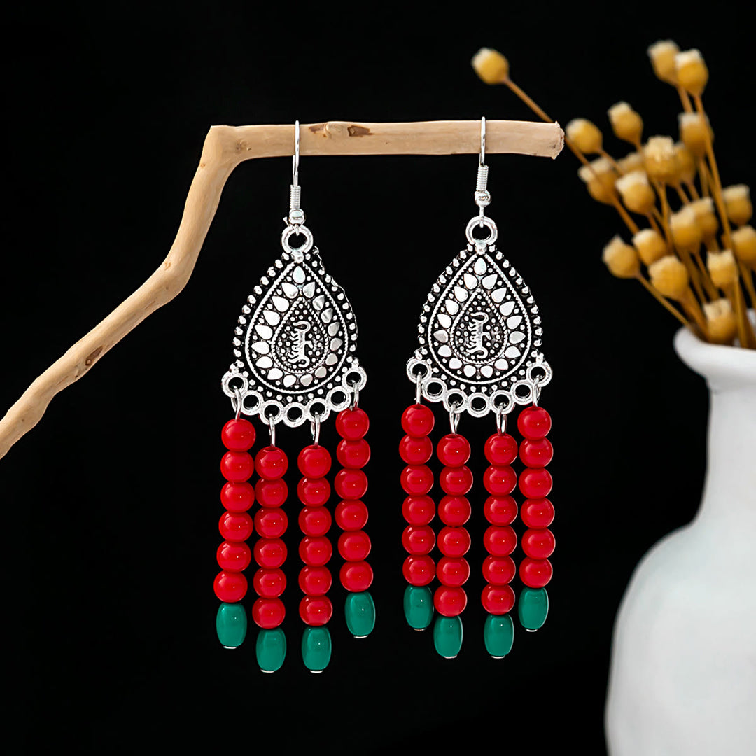 Boucles d'oreilles Olivenorma style ethnique rétro bohème à pampilles turquoise