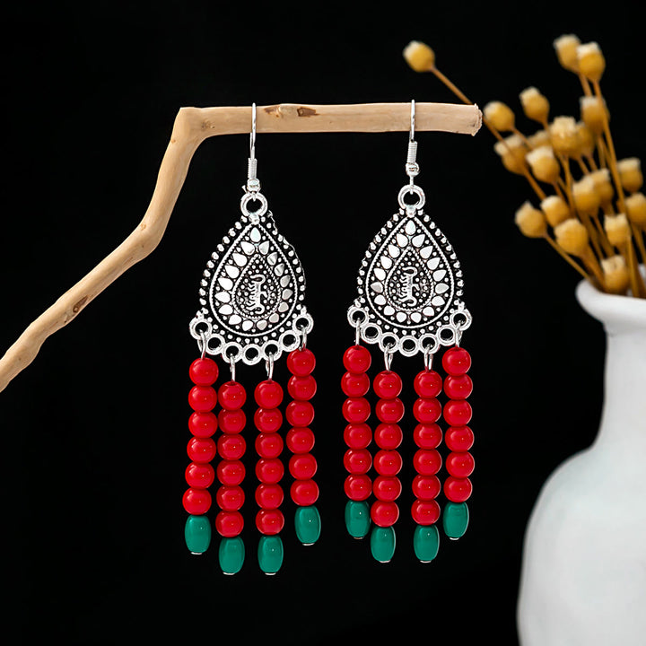 Boucles d'oreilles Olivenorma style ethnique rétro bohème à pampilles turquoise