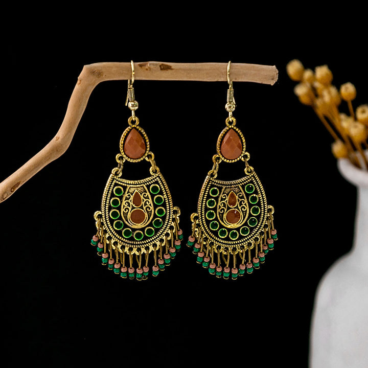 Boucles d'oreilles Olivenorma style ethnique rétro bohème à pampilles turquoise