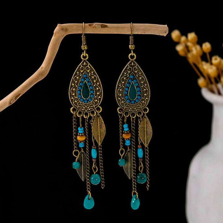 Boucles d'oreilles Olivenorma style ethnique rétro bohème à pampilles turquoise