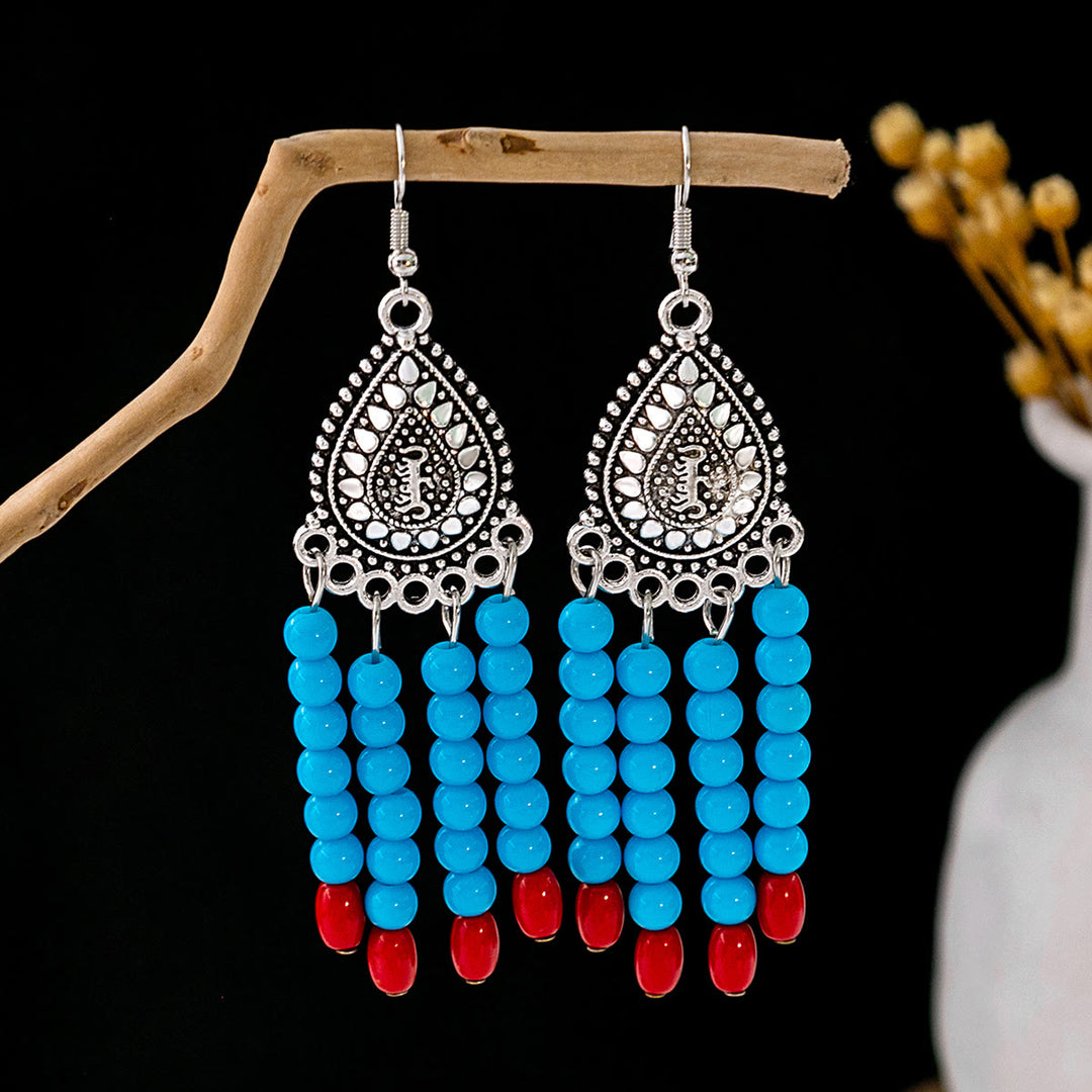 Boucles d'oreilles Olivenorma style ethnique rétro bohème à pampilles turquoise