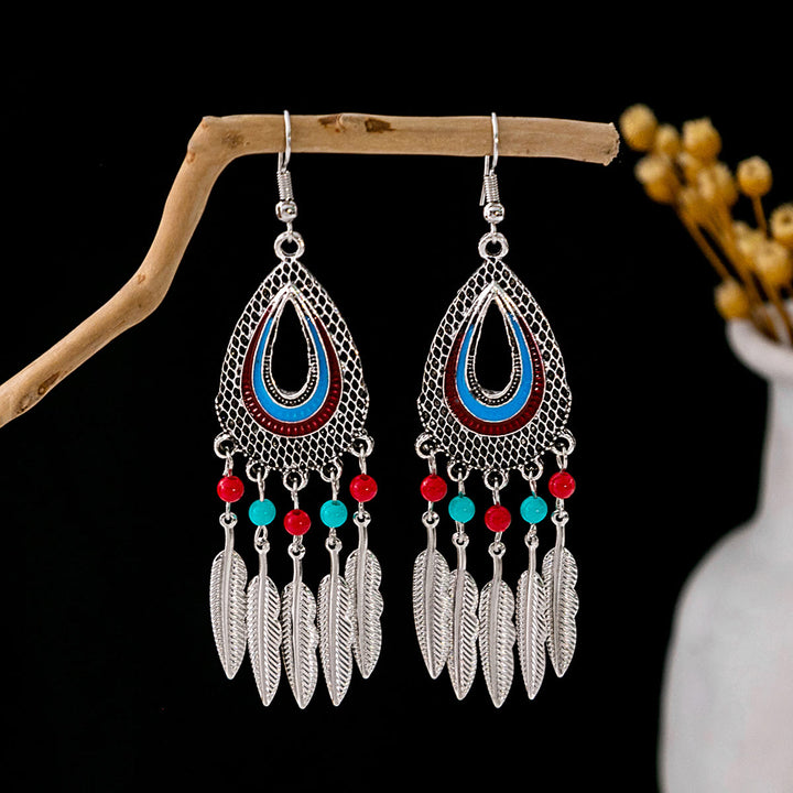 Boucles d'oreilles Olivenorma style ethnique rétro bohème à pampilles turquoise
