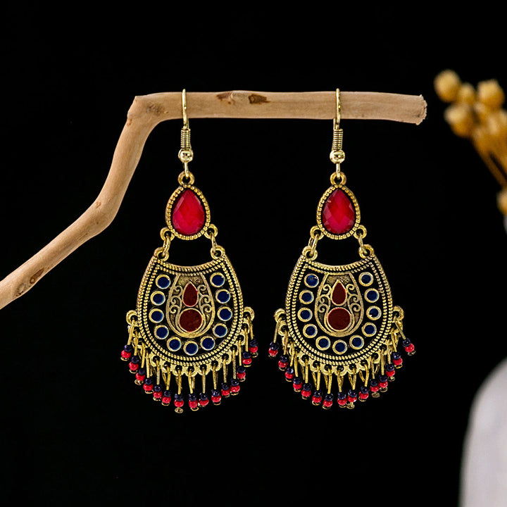 Boucles d'oreilles Olivenorma style ethnique rétro bohème à pampilles turquoise