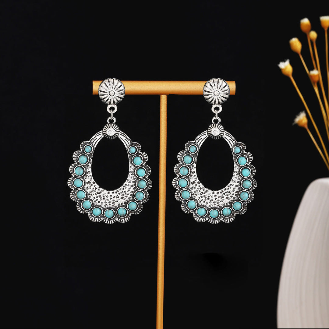 Boucles d'oreilles Olivenorma style ethnique rétro bohème à pampilles turquoise