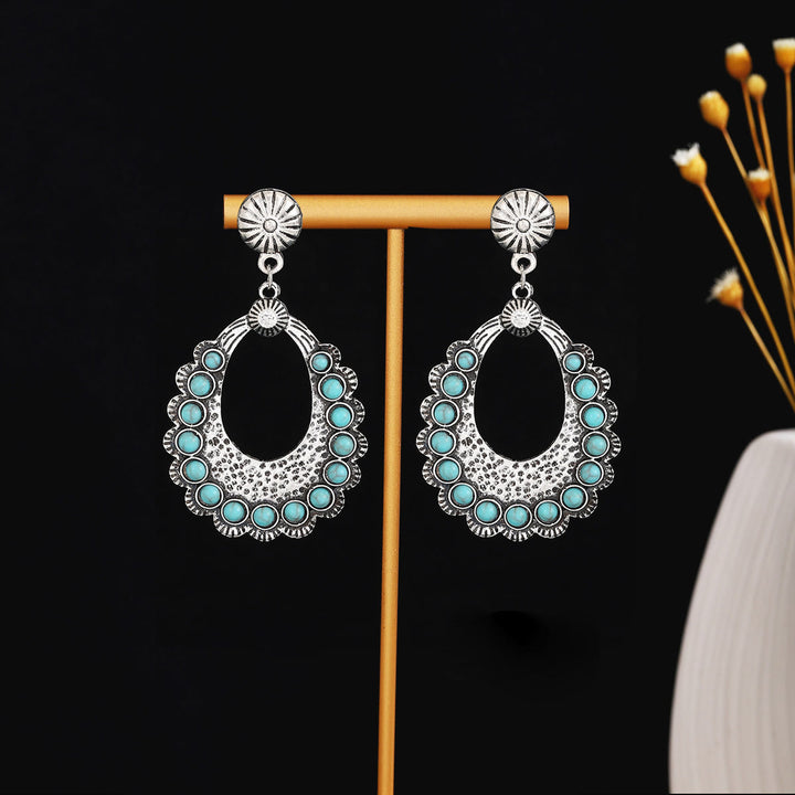 Boucles d'oreilles Olivenorma style ethnique rétro bohème à pampilles turquoise