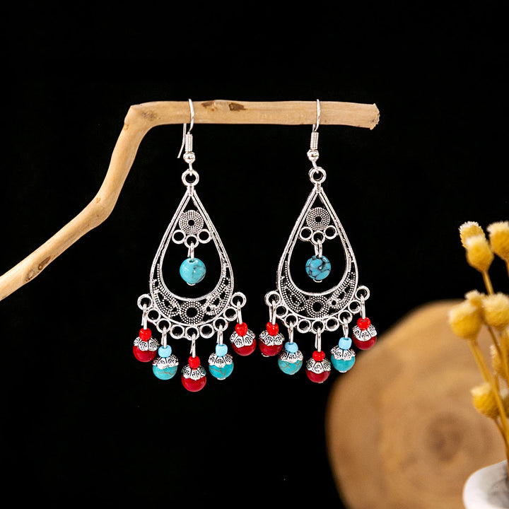 Boucles d'oreilles Olivenorma style ethnique rétro bohème à pampilles turquoise