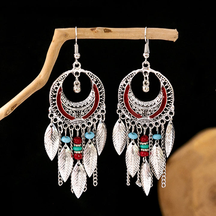 Boucles d'oreilles Olivenorma style ethnique rétro bohème à pampilles turquoise
