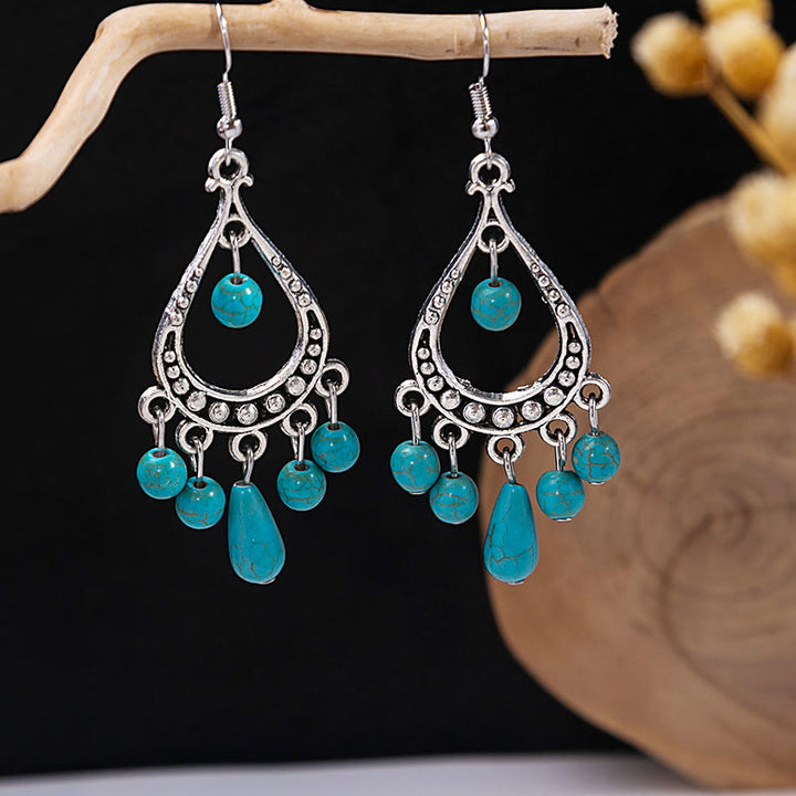 Boucles d'oreilles Olivenorma style ethnique rétro bohème à pampilles turquoise