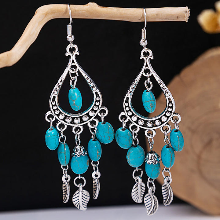 Boucles d'oreilles Olivenorma style ethnique rétro bohème à pampilles turquoise