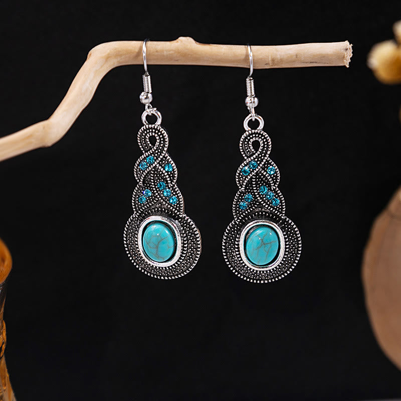 Boucles d'oreilles Olivenorma style ethnique rétro bohème à pampilles turquoise