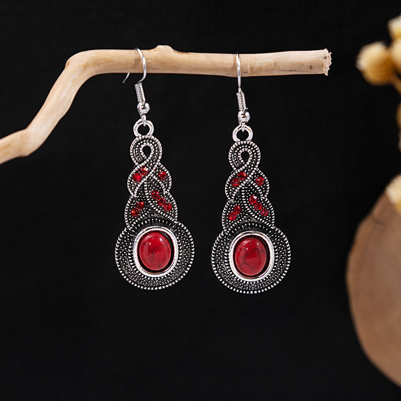 Boucles d'oreilles Olivenorma style ethnique rétro bohème à pampilles turquoise