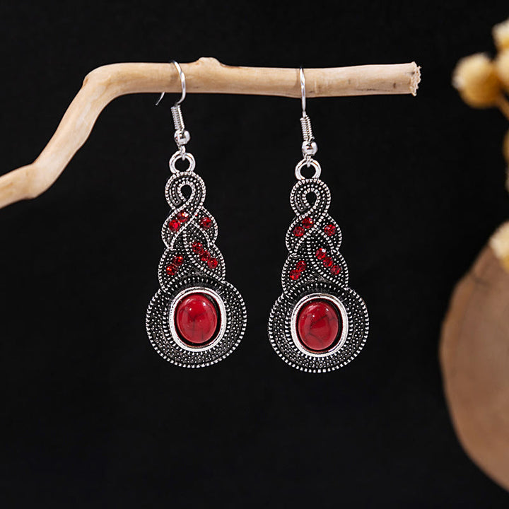 Boucles d'oreilles Olivenorma style ethnique rétro bohème à pampilles turquoise