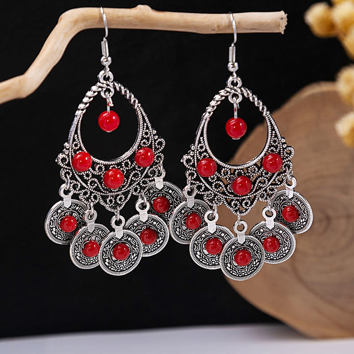 Boucles d'oreilles Olivenorma style ethnique rétro bohème à pampilles turquoise