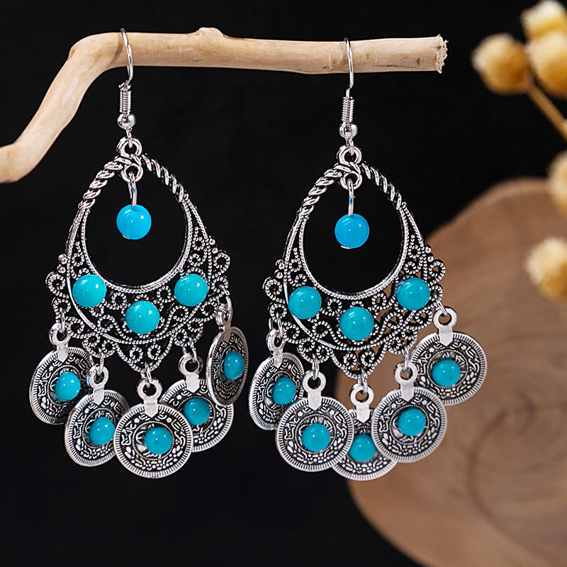 Boucles d'oreilles Olivenorma style ethnique rétro bohème à pampilles turquoise